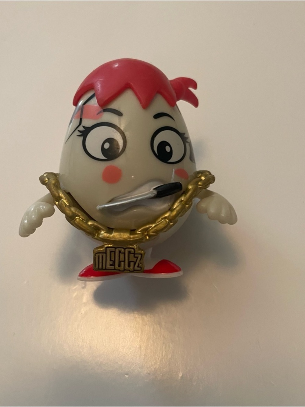 MEggz Egg Character Figure with Pink Hair and Gold Chain